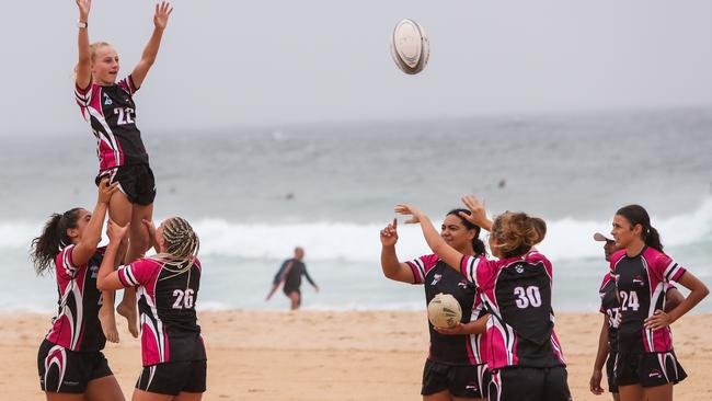 South East Magic Girls 7's rugby team training on Maroubra Beach under the watchful eye of coach Fidel Tukel. Picture: Julian Andrews.