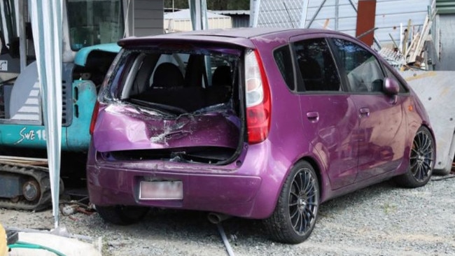 A damaged car at scene of an alleged attempted murder, where a 27-year-old man allegedly drove over a woman in a Caboolture backyard. Picture: Liam Kidston.