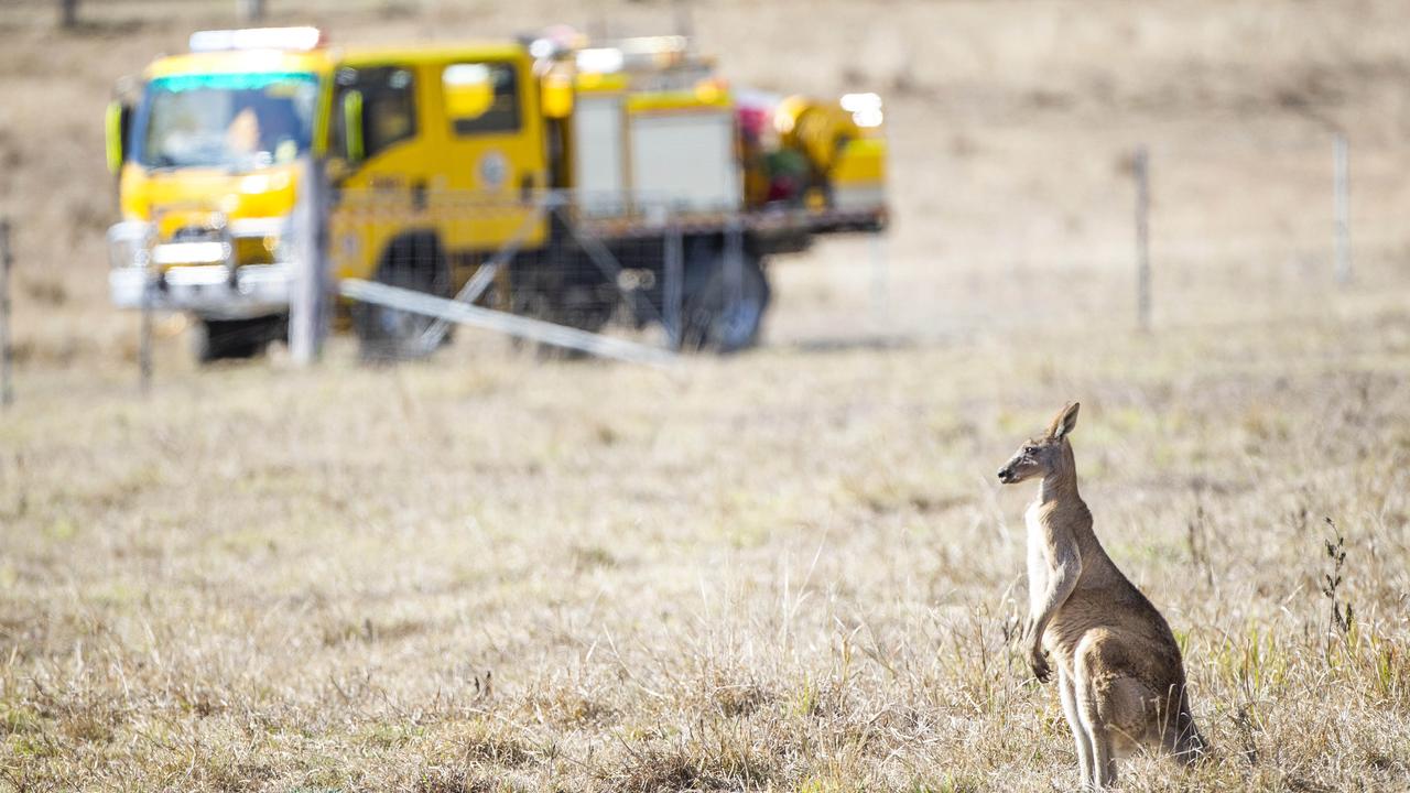 Firefighters brace for the worst as fires continue to burn in the Canungra and Sarabah regions. Picture: NIGEL HALLETT