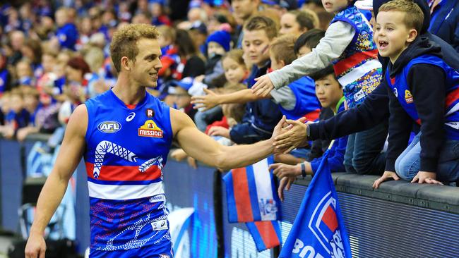 Mitch Wallis enjoys last Saturday’s win against St Kilda with Dogs fans. Picture: Mark Stewart