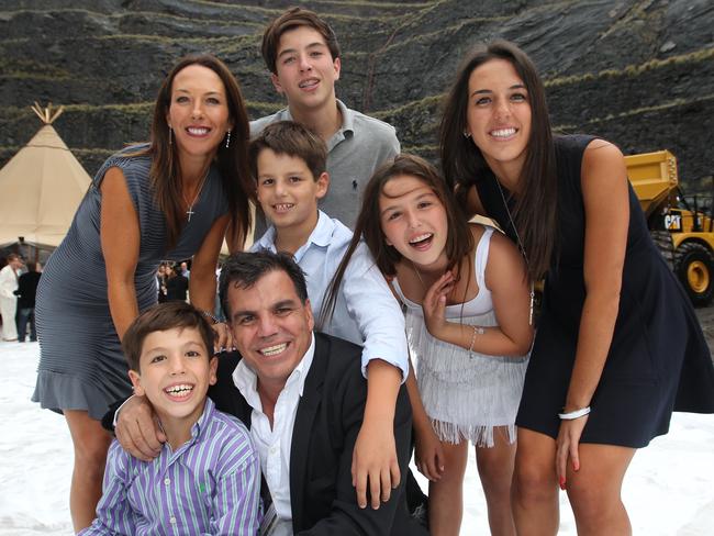 Larissa and Ian Malouf with their children Jack, Max, Ed, Lara and Ellie in the landfill site at Eastern Creek in Western Sydney in 2011.