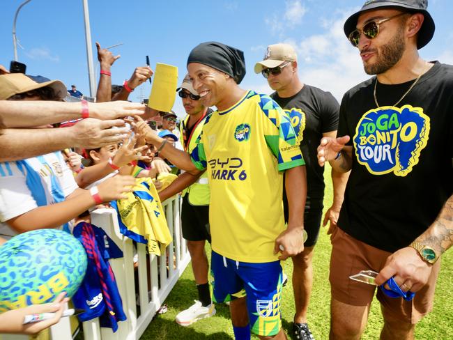 Former Brazilian football superstar Ronaldinho GaÃºcho joined with Australia's greatest player Tim Cahill to bring their Joga Bonito Tour to the Gold Coast on Sunday, November 3. The game was held at Merrimac Football Club. Picture: Nathan Richter