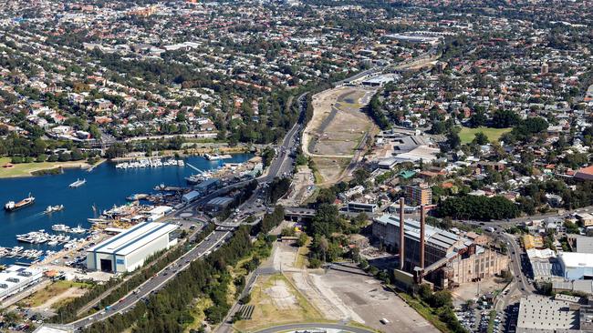 The proposed overpass will see a 15m-wide green link between new parkland at the site of the old Rozelle rail yards and a light rail stop at Rozelle Bay.