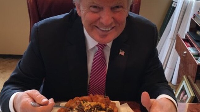 Thumbs up: Donald Trump gives a taco bowl his seal of approval.