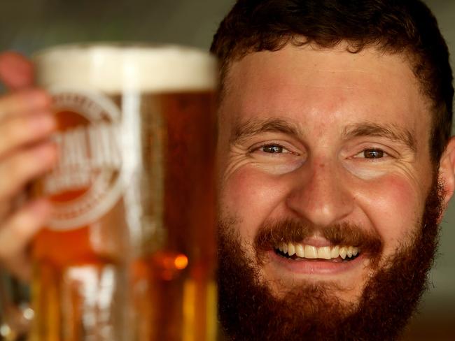 Max Haemmerle shows off one of the company’s top beers.