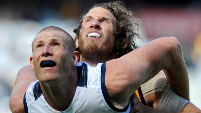 Sam Jacobs battles Hawthorn’s Ty Vickery at the MCG. Jacobs was huge — both physically and in influence — against the Hawks. Picture: Joe Castro (AAP)