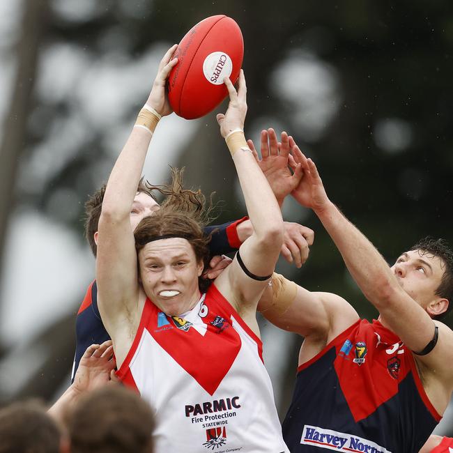 Clarence's Sam Green marks in front of North Hobart's Julian Dobosz. Picture: Zak Simmonds