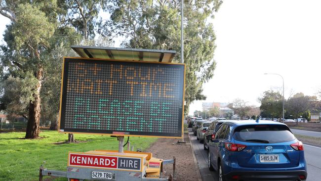 Cars lined up along Fullarton Road heading towards Victoria Park testing clinic on Wednesday morning, July 21. Picture: Dean Martin