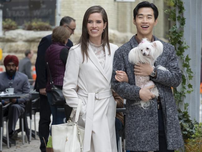 Daniela Barbosa and Henry Lau in A Dog's Journey. .