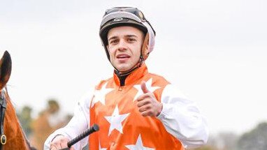 The late Chris Caserta after booting home Queen La Diva to win at Flemington in 2020. Picture : Racing Photos via Getty Images.