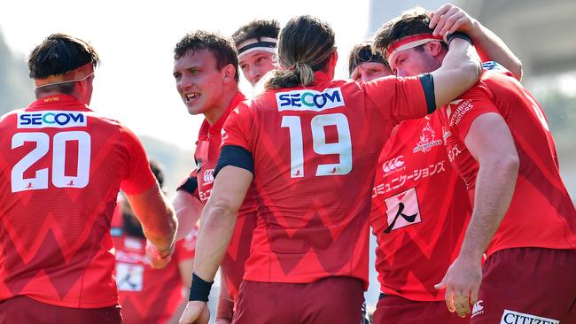 Sunwolves players celebrate their win over the Rebels. Picture: Getty Images