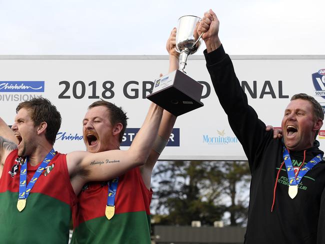 Pines lift the 2018 MPNFL Division 1 premiership cup. Picture: Andy Brownbill)