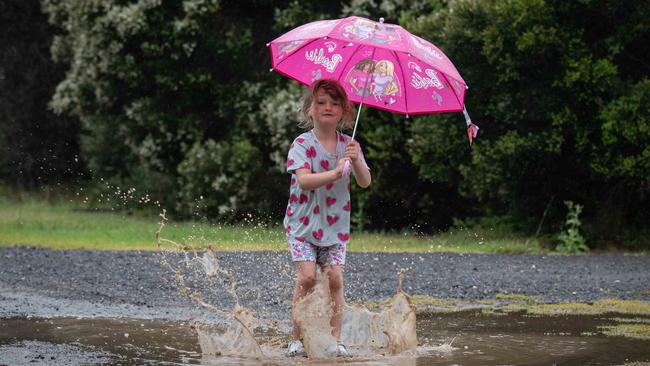 Payten Farnsworth, 5 from Ballarat enjoys the puddles at the Ocean Grove caravan park. Picture: Brad Fleet