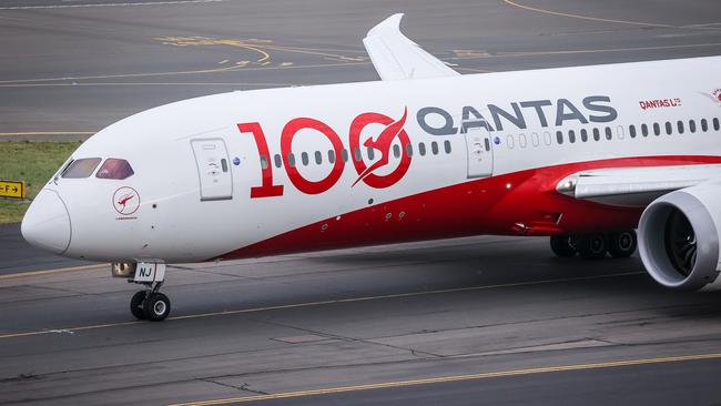 Qantas is the target of a class action brought by 22 employees opposed to the airline’s mandatory vaccination policy for workers. Picture: David Gray/Getty Images for Destination New South Wales