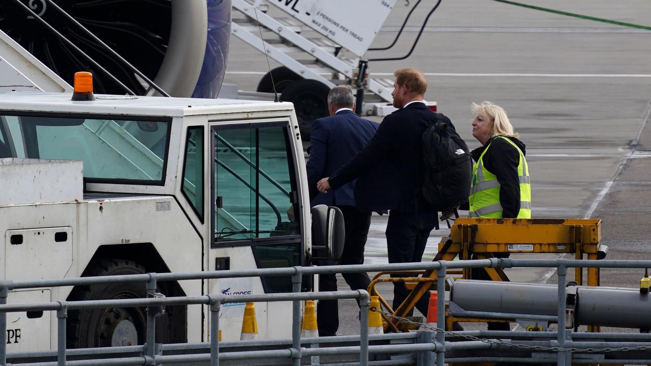 Harry boards the plane after leaving Balmoral. Picture: Peter Summers/Getty Images