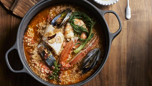 Carolino rice, soup of the sea, saffron at Marmelo, Melbourne. Photo: Anson Smart