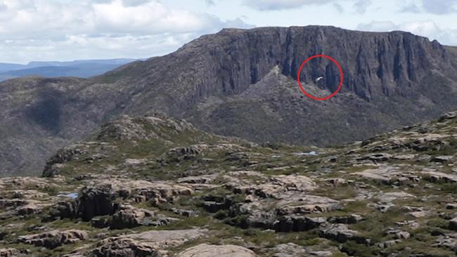 A helicopter flies low over Tasmania's World Heritage wilderness. Picture: Supplied