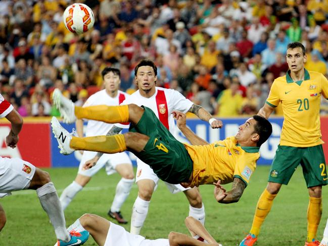 Australia's Tim Cahill performs a overhead kick to score Australia's first goal during the AFC Asia Cup quarterfinal soccer match between China and Australia in Brisbane, Australia, Thursday, Jan. 22, 2015. (AP Photo/Tertius Pickard)