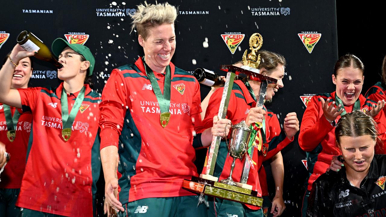 Tasmanian tigers captain Elyse Villani celebrates with her team after winning the WNCL final against Queensland at Bellerive Oval on February 24, 2024. Picture: Steve Bell/Getty Images