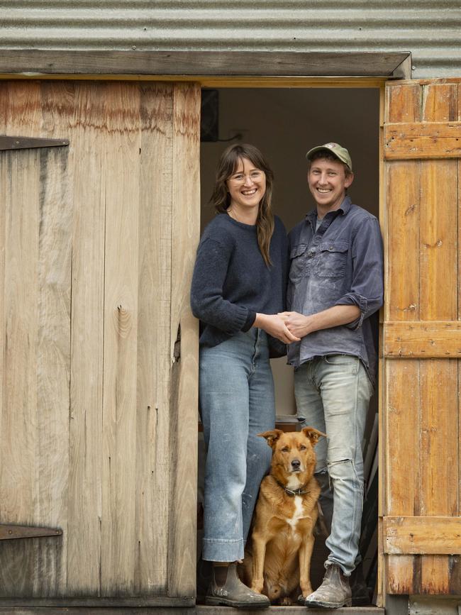 Courtney Young and Ian Congdon with their Kelpie-Koolie cross Jip. Pictures: Zoe Phillips