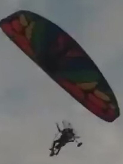 Hamas fighters parachuting into the Israeli music festival Supernova. Picture: TikTok