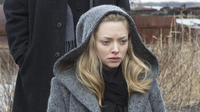 Amanda Seyfried as parishioner Mary.