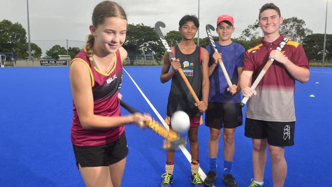 Townsville hockey juniors Sophie Davis, left, with friends in Townsville. Picture: MATTHEW ELKERTON