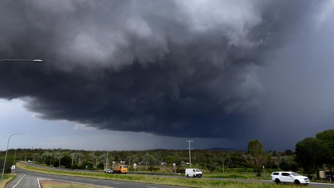 A storm front approaches Yamanto in Ipswich. Picture: AAP/David Clark