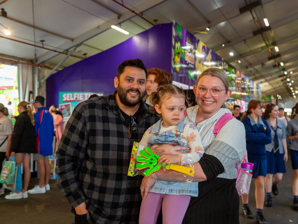 51 pics: Ekka-goers brave big wet on day 3 | The Courier Mail