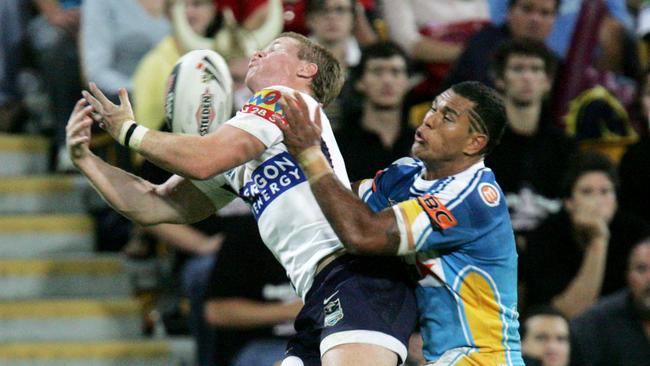 Brisbane's Steve Michaels beats Jake Webster to a high ball (AAP Image/Colin Whelan/Action Photographics)