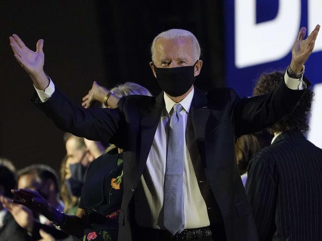 Joe Biden is leading by example, wearing a mask to protect him from the threat of COVID-19. Picture: AFP