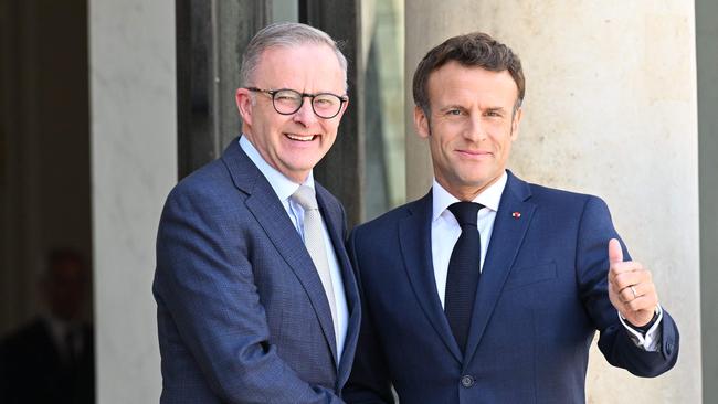 Mr Albanese will bring up the free trade talks when he sees Mr Macron in Lithuania at the NATO summit. (Photo by Emmanuel Dunand / AFP)