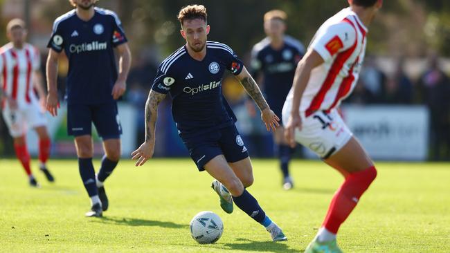 Alex Salmon in action for Oakleigh Cannons.