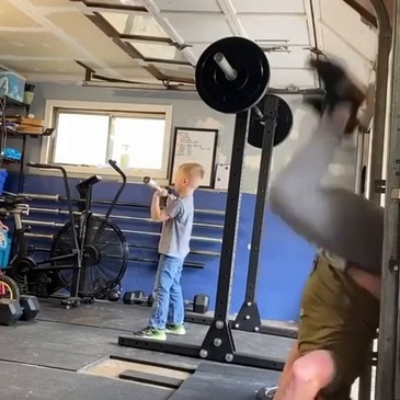 'Good Job, Buddy': Dad Shows Boy How to Properly Hit the Gym