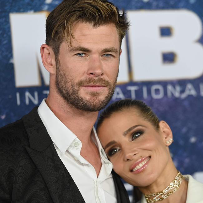 Hemsworth and Pataky on the red carpet. Picture: AFP