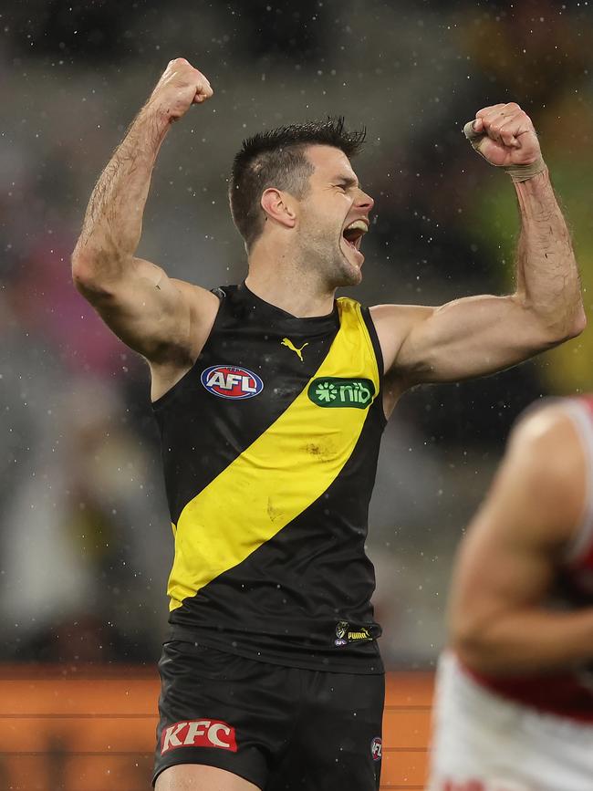 Trent Cotchin of the Tigers celebrates.