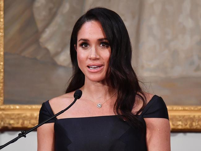 Meghan Markle, the Duchess of Sussex, speaks to invited guests during a reception at Government House in Wellington, New Zealand, Sunday, October 28, 2018. The Duke and Duchess of Sussex are on a three-week tour of Australia, New Zealand, Tonga, and Fiji. (AAP Image/AFP Pool, Marty Melville) NO ARCHIVING