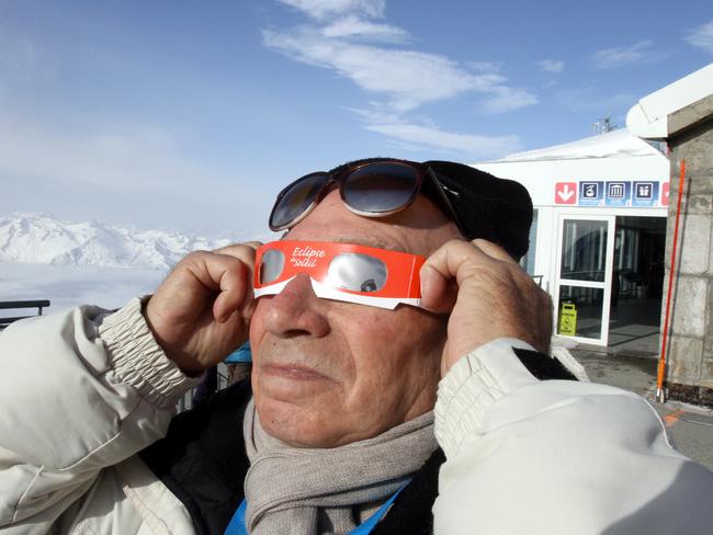 A man watches the eclipse from the south-western Pyrenees mountains. Picture: AFP PHOTO / LAURENT DARD