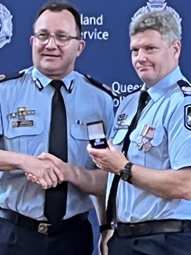 Assistant Commissioner Brian Connors with Acting Senior Sergeant Dean Heyworth.