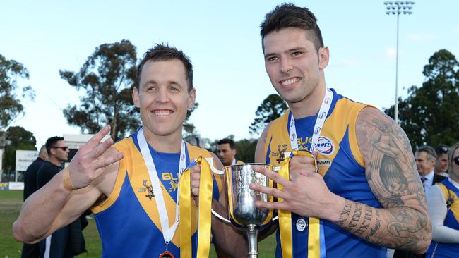 Marc Bullen celebrates Deer Park’s 2015 premiership with champion and ex-skipper Chris Stewart. Picture: David Smith