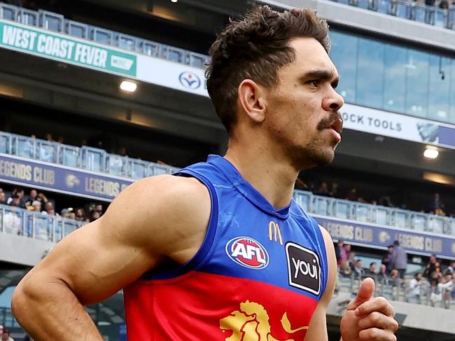 PERTH, AUSTRALIA - JULY 14: Charlie Cameron of the Lions runs out onto the ground during the 2024 AFL Round 18 match between the West Coast Eagles and the Brisbane Lions at Optus Stadium on July 14, 2024 in Perth, Australia. (Photo by Will Russell/AFL Photos via Getty Images)