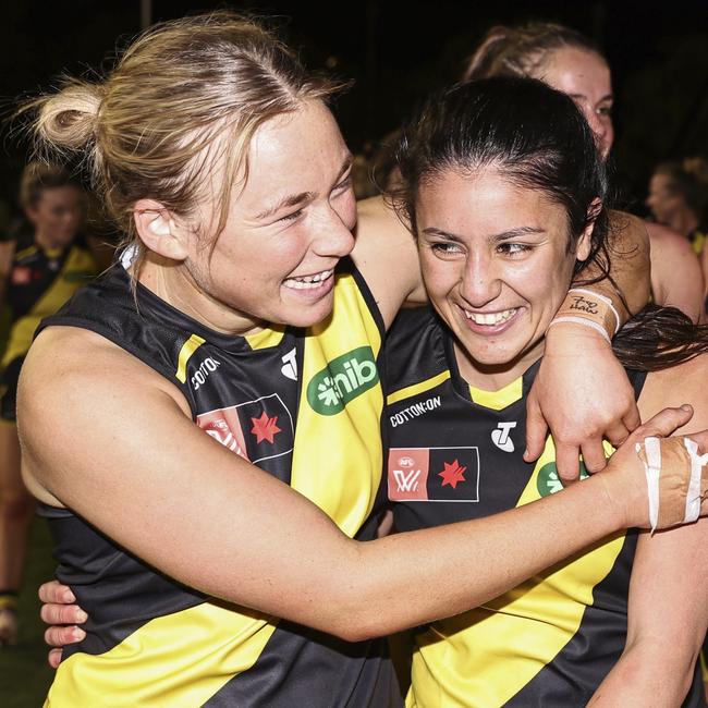 Kodi Jacques of the Tigers celebrates with Emelia Yassir.