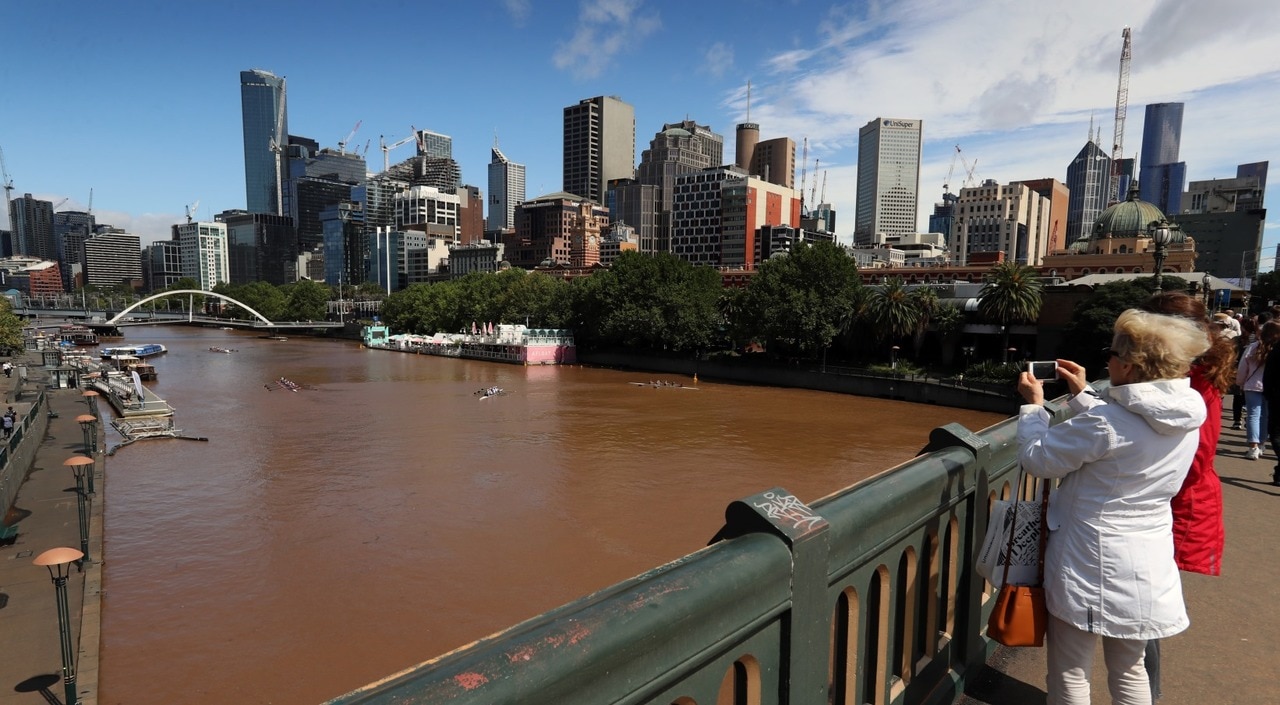 Melbourne clean-up after dirty rain turns the Yarra River brown