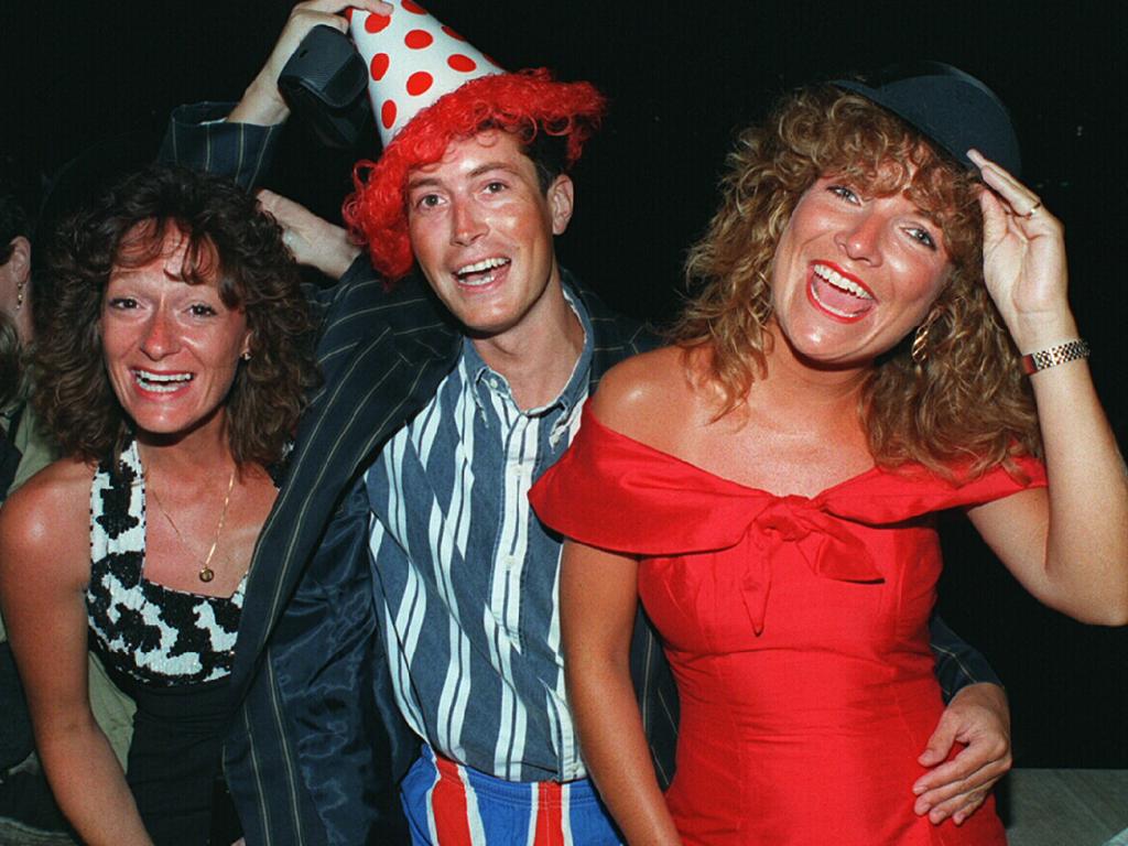 (L-R) English tourists Jill Legge, Rex Northen &amp; Michelle Forster celebrate New Years Eve 1994. Photo: Courier Mail archives