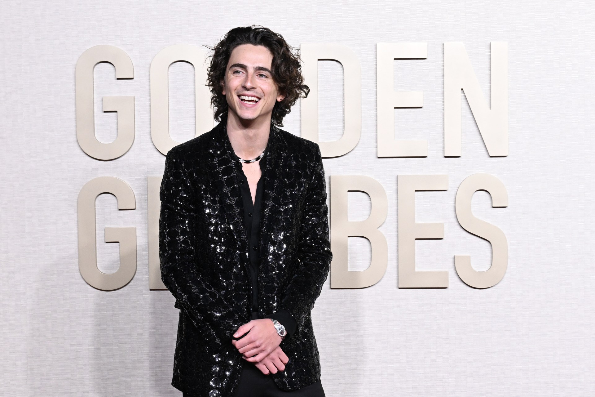 <p><em>Image credit: Getty Images</em></p><h3>Timoth&eacute;e Chalamet in Cartier</h3><p>Chalamet&rsquo;s relationship with Cartier has birthed some truly amazing works of jewellery. His last work was a custom <a href="https://www.vogue.com.au/fashion/news/its-insane-right-timothe-chalamet-worked-with-cartier-on-his-custom-candyinspired-wonka-necklace/image-gallery/f5f0885143d1e5ed1e6d5cb26b377142" target="_blank" rel="noopener">candy-inspired <em>Wonka</em> necklace</a> made with 964 emeralds, rubellites, pink tourmalines and blue opals. For the Globes, things were a little more simple, but only <em>just</em>. Chalamet wore a black and white necklace, but the standout piece was the 2013 diamond-inlaid Cartier Crash, one of the single-most desired watches on the planet.</p>