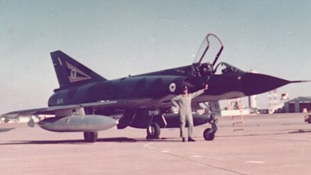 Flight Lieutenant Rod Lovell with Mirage IIIO A3-06 in which he conducted his first solo flight in the fighter. Picture: Supplied by Rod Lovell