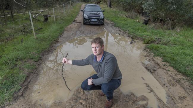 Andrew Hedge says the notorious Heathcote-Kyneton Rd near Redesdale is one of many important roads that have fallen into disrepair over the past decade. Picture: Rob Leeson