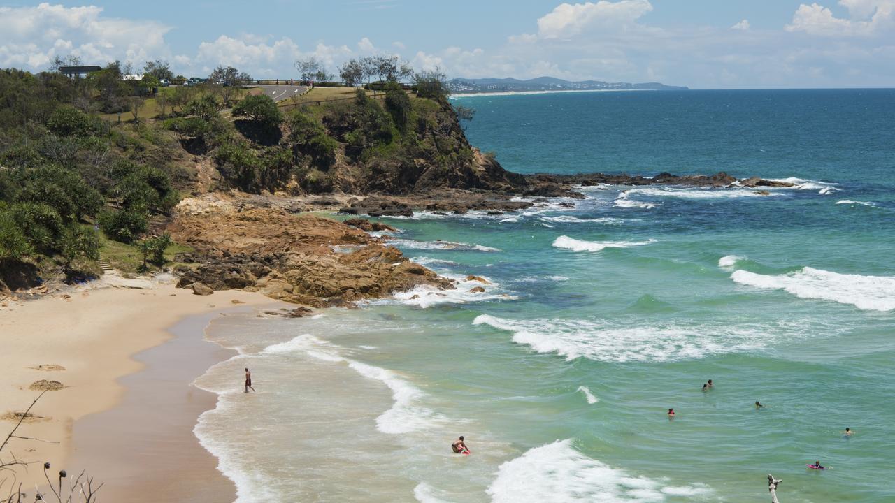 Woman plunges 10m at Sunshine Coast seaside cliff