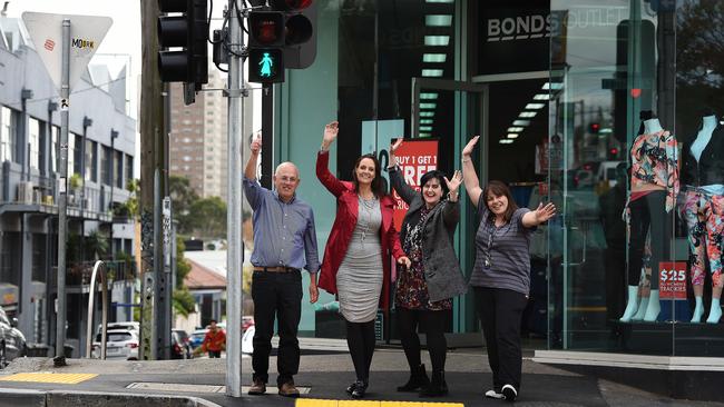 Traders celebrate the new pedestrian crossing in Richmond. Picture: David Smith.