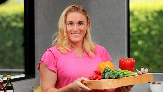 8th February 2021 - Olympic champion and Coles ambassador Sally Pearson preparing a healthy meal in her kitchen as part of the Coles 28-day 